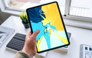 Person Holding Tablet